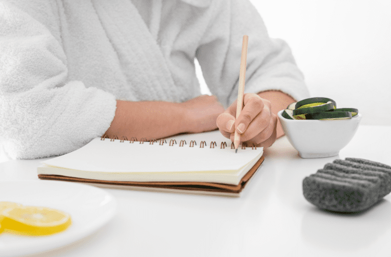 Person journaling peacefully, demonstrating JalbiteHealth mindfulness and mental wellness practices